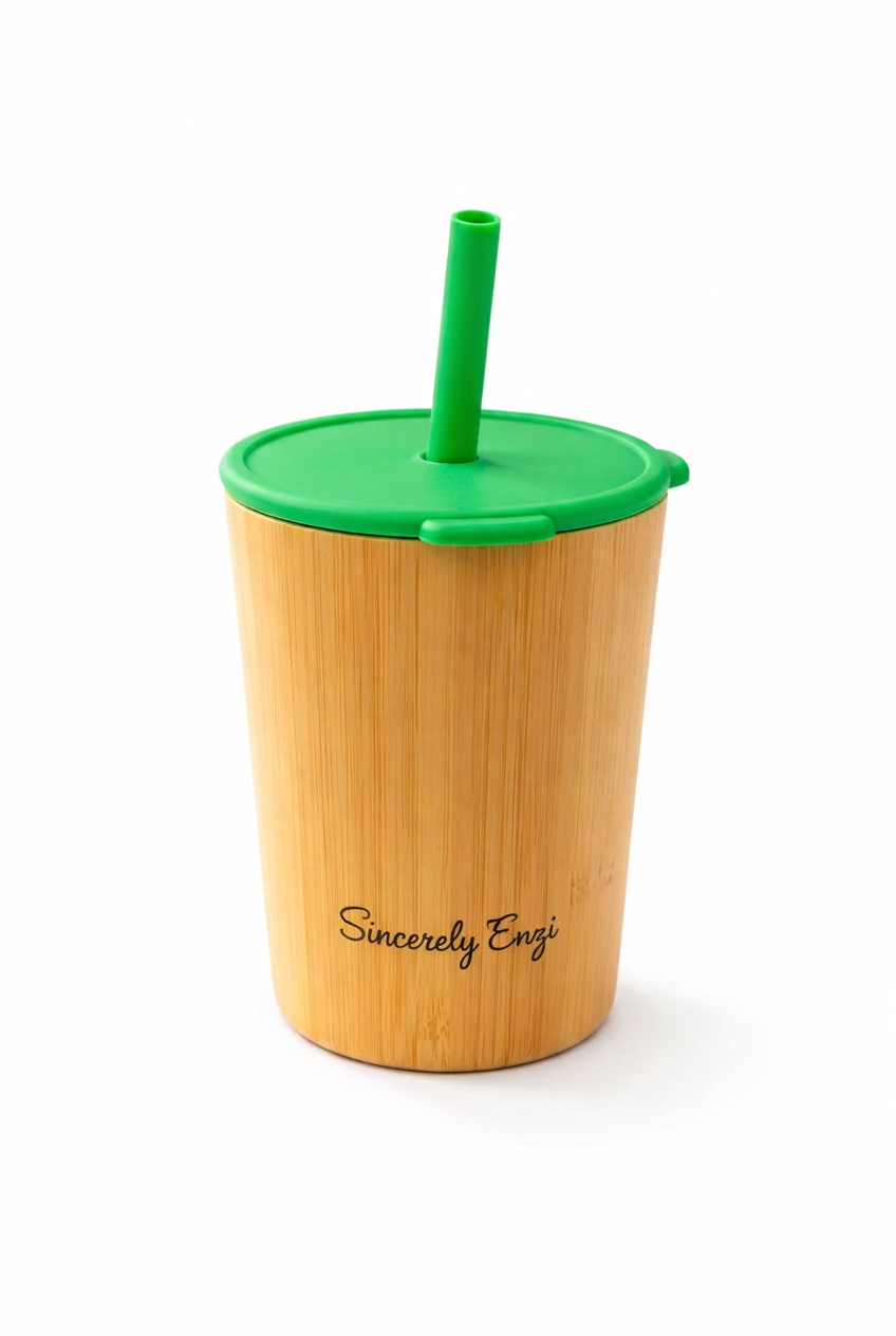 Bamboo cup with green lid and straw
