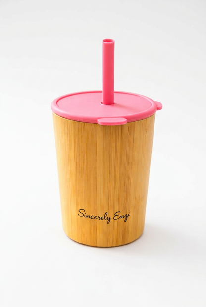 Bamboo cup with pink lid and straw